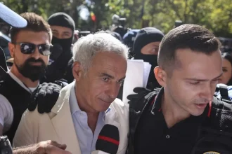Călin Georgescu și omul său de încredere, reținuți în dosarul DIICOT pentru înșelăciune